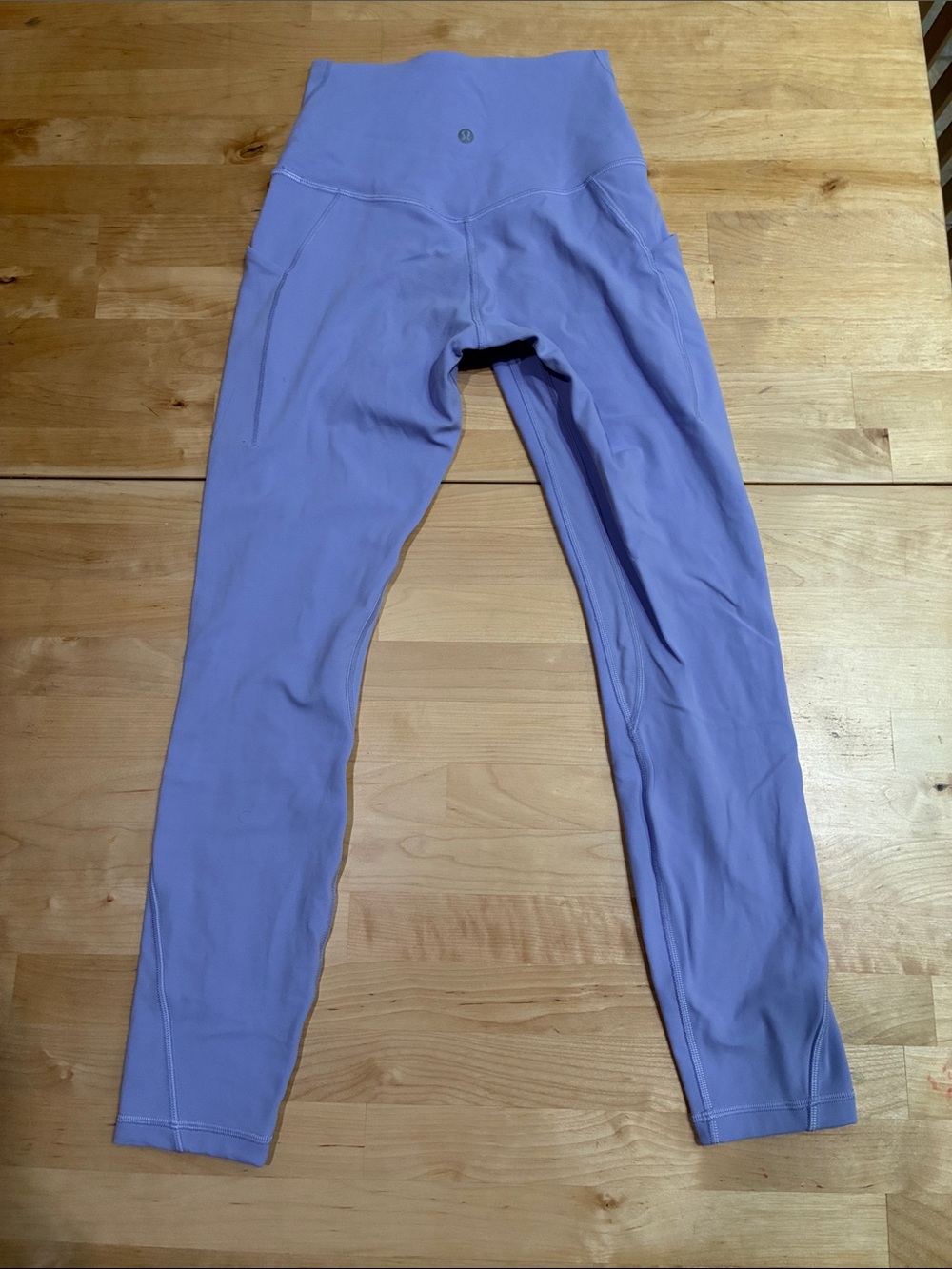 Lululemon women’s 4 Lilac High-Rise Leggings side pocket
